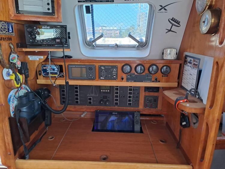 Navigation station of 2019 Custom Patago 40 yacht with control panels and equipment.