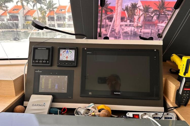 Control panel of a 2016 Fountaine Pajot Ipanema 58 catamaran with navigation instruments.