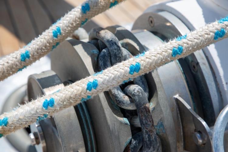 Close-up of a winch and rope on a 1972 Benetti 33 yacht.