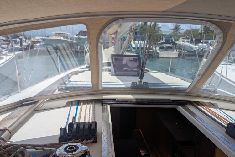 2017 Dufour 460 Grand Large yacht cockpit view in marina setting.