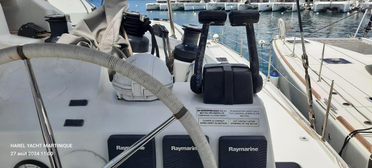 Cockpit of 2017 Fountaine Pajot SABA 50 yacht with Raymarine equipment, docked in marina.