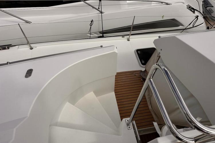 2016 Fountaine Pajot Ipanema 58 yacht deck with sleek design and wooden flooring.