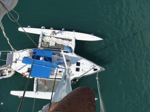 Aerial view of 2005 Custom Polynésie 42 catamaran on calm water.