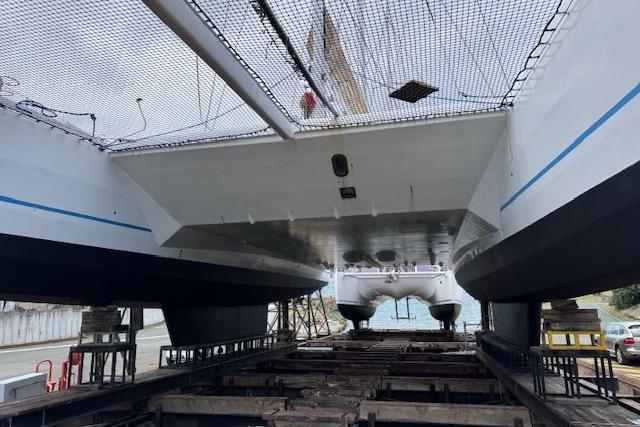 Etoile Marine Maxi Cat 24 catamaran, 2004 model, on dry dock for maintenance.