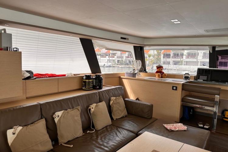 Luxurious interior of 2016 Fountaine Pajot Ipanema 58 catamaran with modern furnishings.