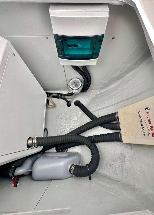 2023 Lagoon 46 yacht interior with plumbing and electrical components.