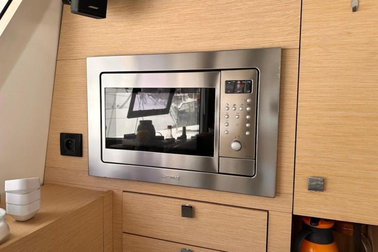 Built-in microwave in 2016 Fountaine Pajot Ipanema 58 yacht kitchen.