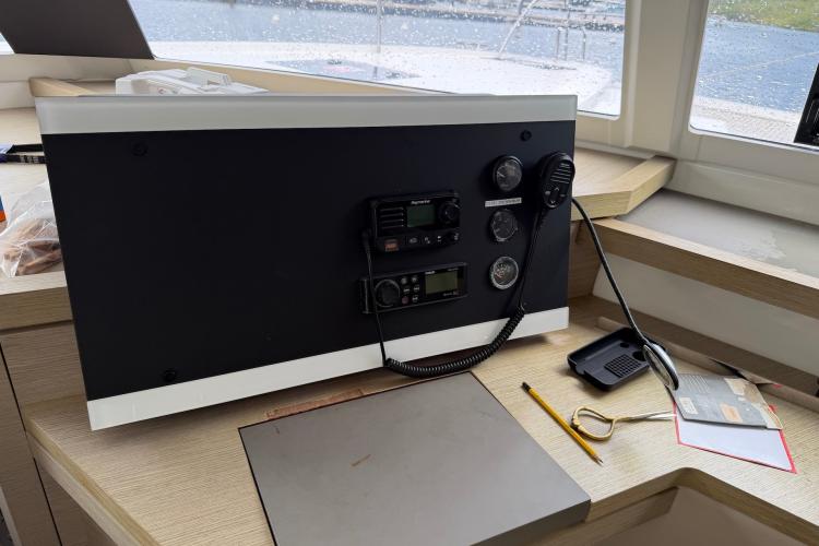 Control panel of a 2020 Fountaine Pajot Astrea 42 catamaran, featuring navigation equipment.