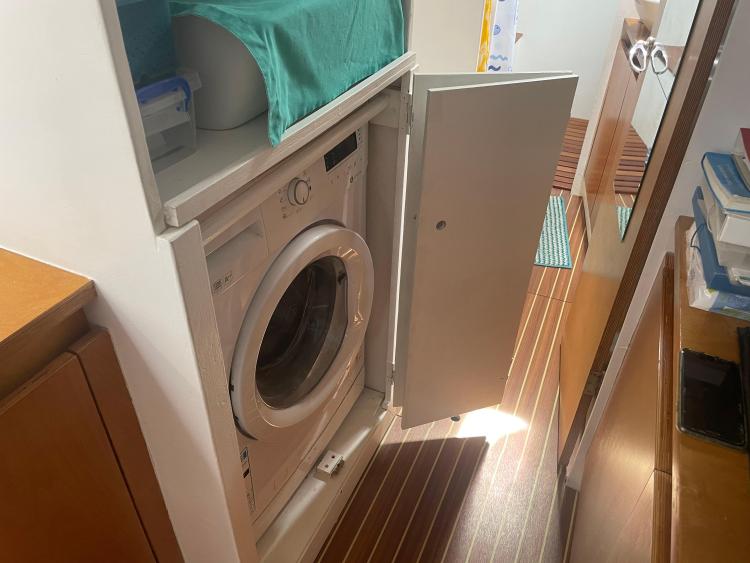 Built-in washing machine in a compact wooden cabinet, Custom KSENIA 149, 2010 model.