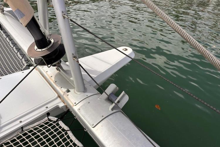 2016 Fountaine Pajot Ipanema 58 catamaran deck detail with netting and water view.