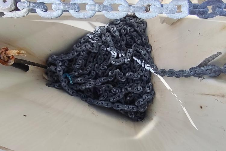 Anchor chain in Jeanneau Sun Odyssey 37 sailboat's locker, 2000 model.
