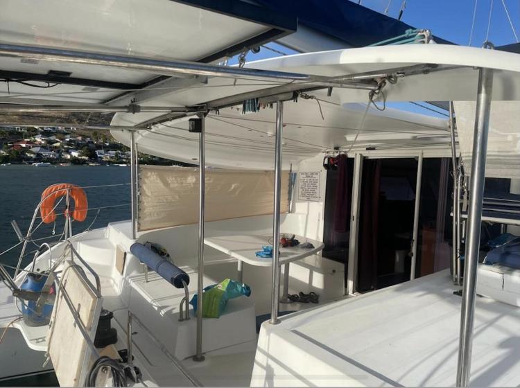 2009 Fountaine Pajot Orana 44 catamaran deck with seating and ocean view.