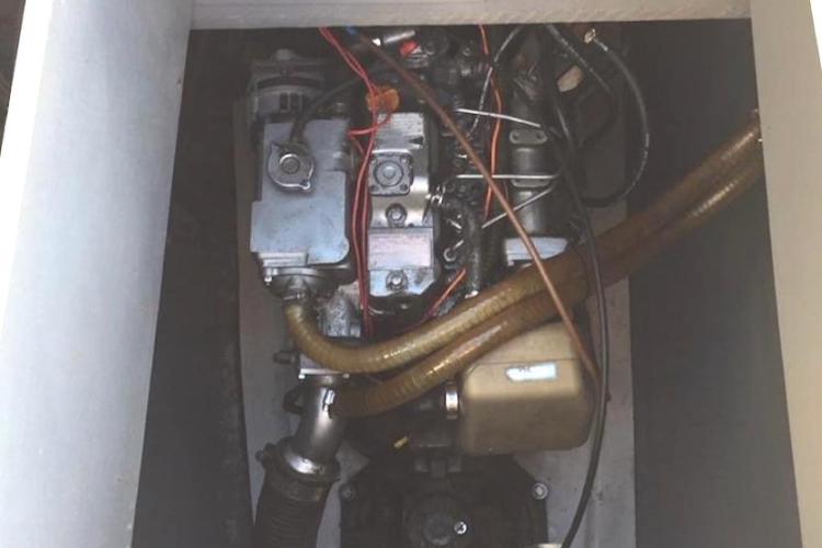 Engine compartment of a 2009 Fountaine Pajot Orana 44 catamaran, showing mechanical components and wiring.
