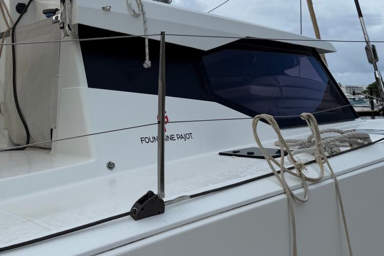 2020 Fountaine Pajot Astrea 42 catamaran, sleek design with ropes and tinted windows.