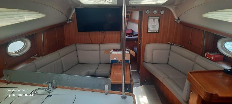 Interior of 2007 Elan Impression 434 yacht with cozy seating and modern amenities.