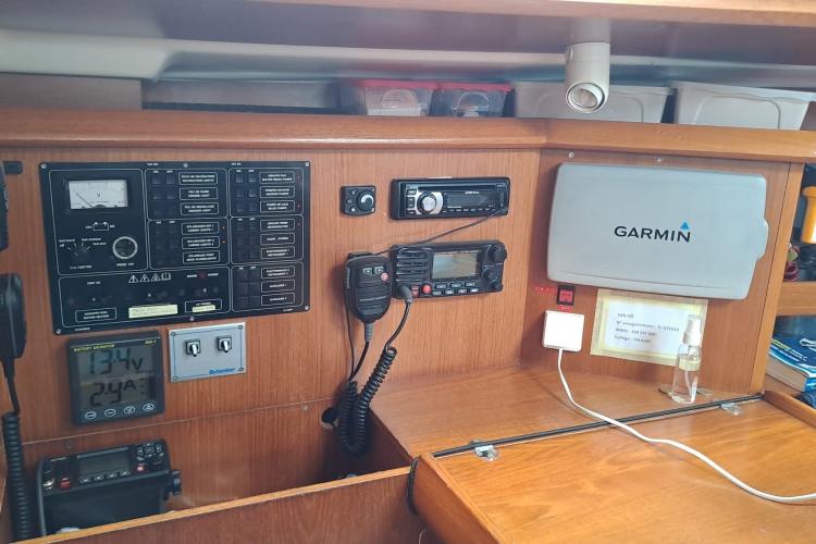 Control panel of a 2000 Jeanneau Sun Odyssey 37 sailboat with Garmin navigation equipment.
