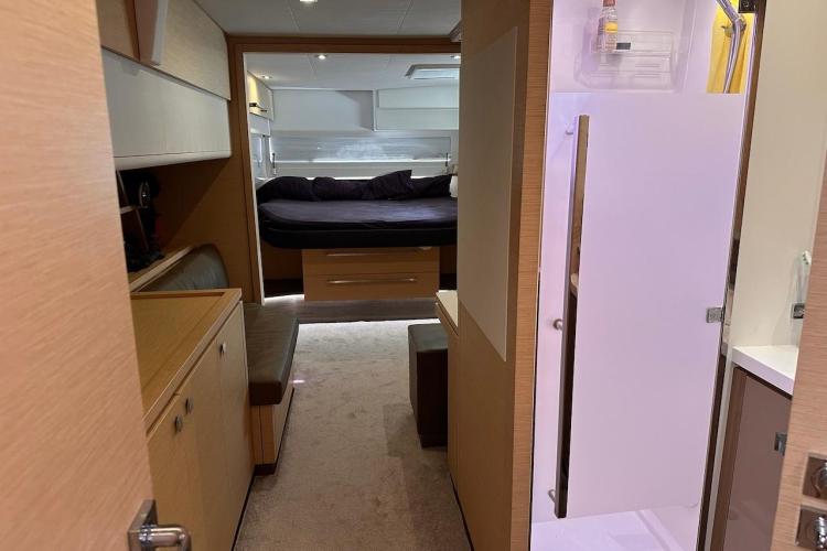 Interior of 2016 Fountaine Pajot Ipanema 58 yacht, featuring cozy cabin and modern furnishings.