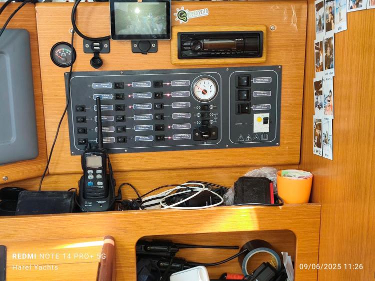 Control panel of a 2005 Beneteau Cyclades 43.3 yacht with various instruments and equipment.