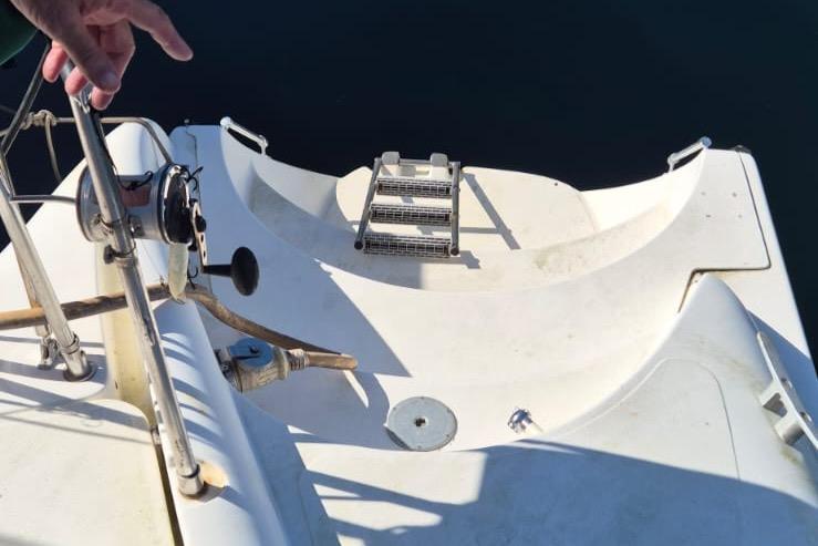 Stern view of 1999 Fountaine Pajot Bahia 46 catamaran with ladder and railing.